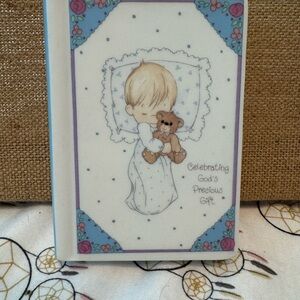 Boys Precious Moments Bible with a porcelain holder.